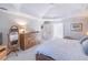 Main bedroom with ample closet space and neutral decor at 9970 Groomsbridge Rd, Johns Creek, GA 30022