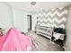 Bedroom with crib, play tent, and bassinet at 2267 Nottley Walk, Marietta, GA 30066