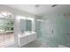 Elegant bathroom with double vanity and large shower at 1529 Bell Flower Ct, Stone Mountain, GA 30088