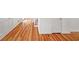 Image of newly refinished hardwood floors at 1529 Bell Flower Ct, Stone Mountain, GA 30088