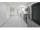 Modern kitchen featuring stainless steel appliances and white cabinetry at 1529 Bell Flower Ct, Stone Mountain, GA 30088