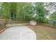 Concrete patio with ample space for seating and grilling at 1529 Bell Flower Ct, Stone Mountain, GA 30088