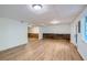 Finished basement offers extra living space with wood accent wall at 1963 Tripp Rd, Woodstock, GA 30188