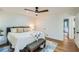 Spacious bedroom with hardwood floors and access to another room at 1963 Tripp Rd, Woodstock, GA 30188