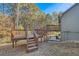 Wooden deck and stairs leading to the yard at 1963 Tripp Rd, Woodstock, GA 30188