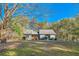 Ranch style home with wooded views and a spacious yard at 1963 Tripp Rd, Woodstock, GA 30188