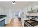 Newly renovated kitchen with white cabinets and a light and airy feel at 1963 Tripp Rd, Woodstock, GA 30188