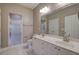 Bathroom features double vanity, a shower, and tile floors at 2500 Rosehill Cir, Lithia Springs, GA 30122