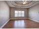 Spacious bedroom with hardwood floors and a ceiling fan at 2500 Rosehill Cir, Lithia Springs, GA 30122