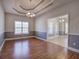 Dining room with hardwood floors and chair railing at 2500 Rosehill Cir, Lithia Springs, GA 30122