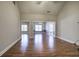 Open living room with hardwood floors and recessed lighting at 2500 Rosehill Cir, Lithia Springs, GA 30122