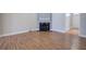 Living room with hardwood floors and a fireplace at 2500 Rosehill Cir, Lithia Springs, GA 30122