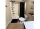 A full bathroom includes a shower and shelves for storage at 3280 Hallmark Ln, Buford, GA 30519