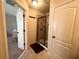 Bathroom with tiled walk-in shower and white door at 3280 Hallmark Ln, Buford, GA 30519