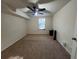 Bright bedroom features carpet and a window offering natural light at 3280 Hallmark Ln, Buford, GA 30519