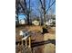 Mailboxes in front of a yellow house on a tree-lined street at 1591 Woodland Se Ave, Atlanta, GA 30316