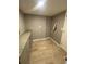 Laundry room with gray cabinets and granite countertop at 1591 Woodland Se Ave, Atlanta, GA 30316