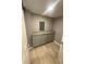 Laundry room with gray cabinets and granite countertop at 1591 Woodland Se Ave, Atlanta, GA 30316