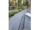 Dark gray asphalt roof shingles and vent at 1591 Woodland Se Ave, Atlanta, GA 30316