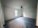 Bright bedroom featuring grey carpet and a window at 1626 Saddlecreek Rd, Auburn, GA 30011