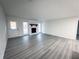 Living room with hardwood floors and fireplace at 1626 Saddlecreek Rd, Auburn, GA 30011