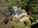 Aerial view of a two-story house with a backyard and neighboring homes at 2400 Reynolds Rd Sw, Atlanta, GA 30331