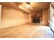 Finished basement with fireplace and wood-look flooring at 2400 Reynolds Rd Sw, Atlanta, GA 30331