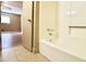 Bathroom with shower/tub combo and wood-look floors at 2400 Reynolds Rd Sw, Atlanta, GA 30331