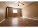 Bright bedroom with ceiling fan and wood-look floors at 2400 Reynolds Rd Sw, Atlanta, GA 30331