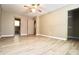 Spacious bedroom with ceiling fan and wood-look floors at 2400 Reynolds Rd Sw, Atlanta, GA 30331