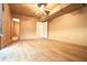 Spacious bedroom with wood-look flooring and access to a bathroom at 2400 Reynolds Rd Sw, Atlanta, GA 30331