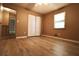 Bedroom with light floors, a closet, and access to a hallway at 2400 Reynolds Rd Sw, Atlanta, GA 30331