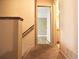 Upper hallway with carpeted floors and doors to rooms at 2400 Reynolds Rd Sw, Atlanta, GA 30331