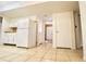 White kitchen cabinets and appliances, tile floor at 2400 Reynolds Rd Sw, Atlanta, GA 30331