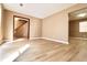 Spacious living room with light wood-look flooring at 2400 Reynolds Rd Sw, Atlanta, GA 30331