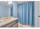 Bathroom with shower/tub combo and updated vanity at 8926 East Carroll Rd, Winston, GA 30187