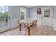 Bright breakfast nook with table and chairs, near sliding door to deck at 8926 East Carroll Rd, Winston, GA 30187