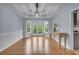 Bright dining room with hardwood floors and French doors at 8926 East Carroll Rd, Winston, GA 30187