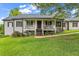 House exterior featuring a porch and landscaping at 8926 East Carroll Rd, Winston, GA 30187