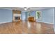 Living room with hardwood floors and fireplace at 8926 East Carroll Rd, Winston, GA 30187