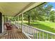 Front porch with rocking chair, overlooking yard at 8926 East Carroll Rd, Winston, GA 30187