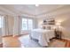 Bright bedroom with hardwood floors, large windows, and a comfortable bed at 1506 Lavista Proper Cir, Decatur, GA 30033