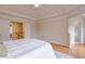 Main bedroom with hardwood floors, access to bathroom and another room at 1506 Lavista Proper Cir, Decatur, GA 30033