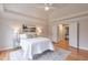 Spacious bedroom with hardwood floors, large windows, and access to another room at 1506 Lavista Proper Cir, Decatur, GA 30033