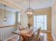 Spacious dining room with hardwood floors and chandelier at 1506 Lavista Proper Cir, Decatur, GA 30033