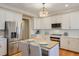 Modern kitchen featuring white cabinets, stainless steel appliances, and hardwood floors at 1506 Lavista Proper Cir, Decatur, GA 30033