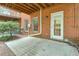 Concrete patio situated adjacent to a brick townhome at 1506 Lavista Proper Cir, Decatur, GA 30033