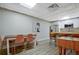 Basement kitchenette with white cabinets and wood countertop at 8322 Saucier Dr, Douglasville, GA 30135