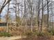 Wooded community with walking paths and lake access at 1710 Aurelia Dr, Cumming, GA 30041