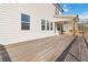Large backyard wooden deck perfect for entertaining and relaxing outdoors, with the house on the side at 2131 Landsburg Way, Lawrenceville, GA 30043